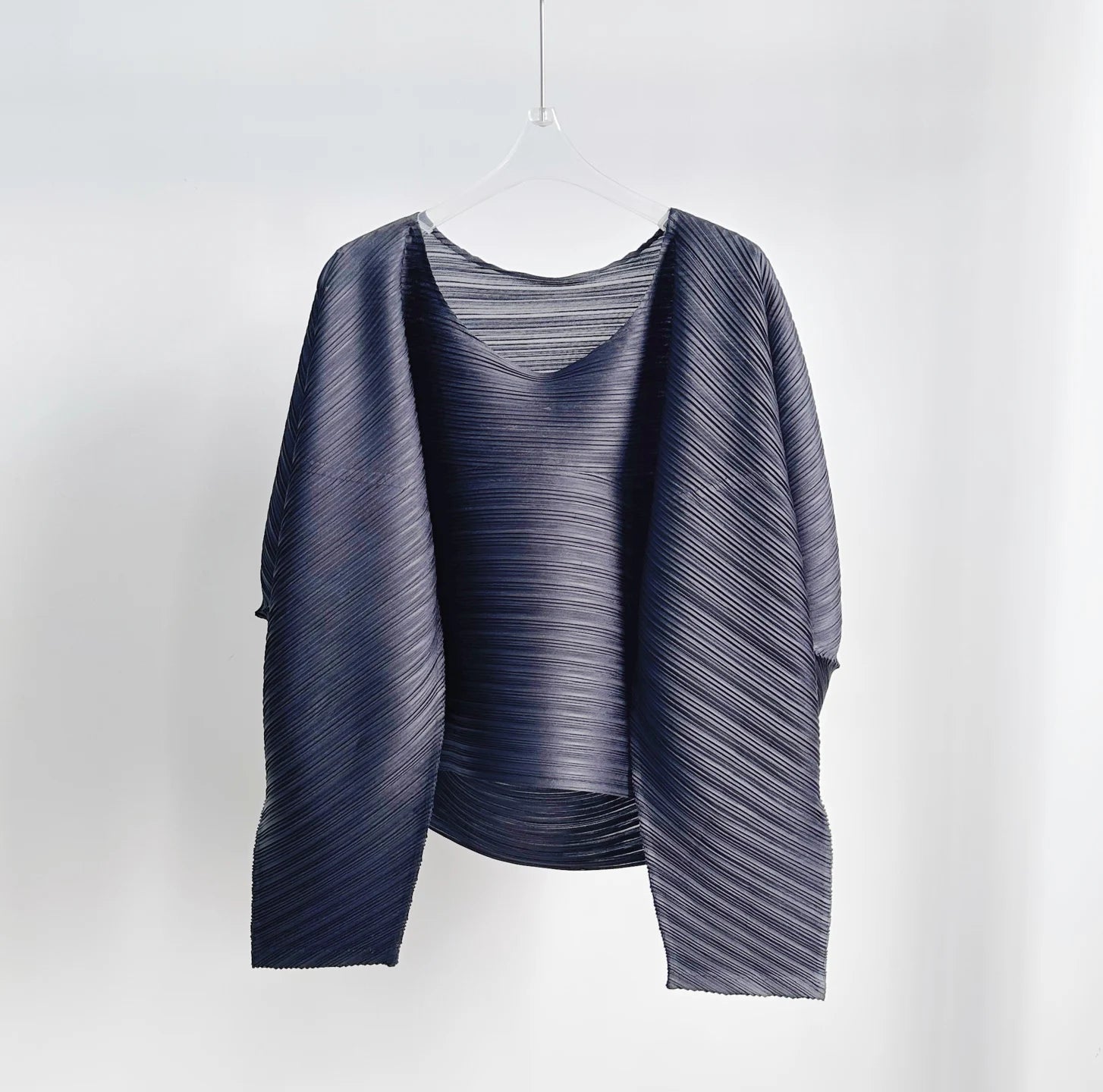 Miyake plissé couleur unie col rond haut 2025 printemps et été nouveau tempérament décontracté à manches longues Cardigan mince T-shirt